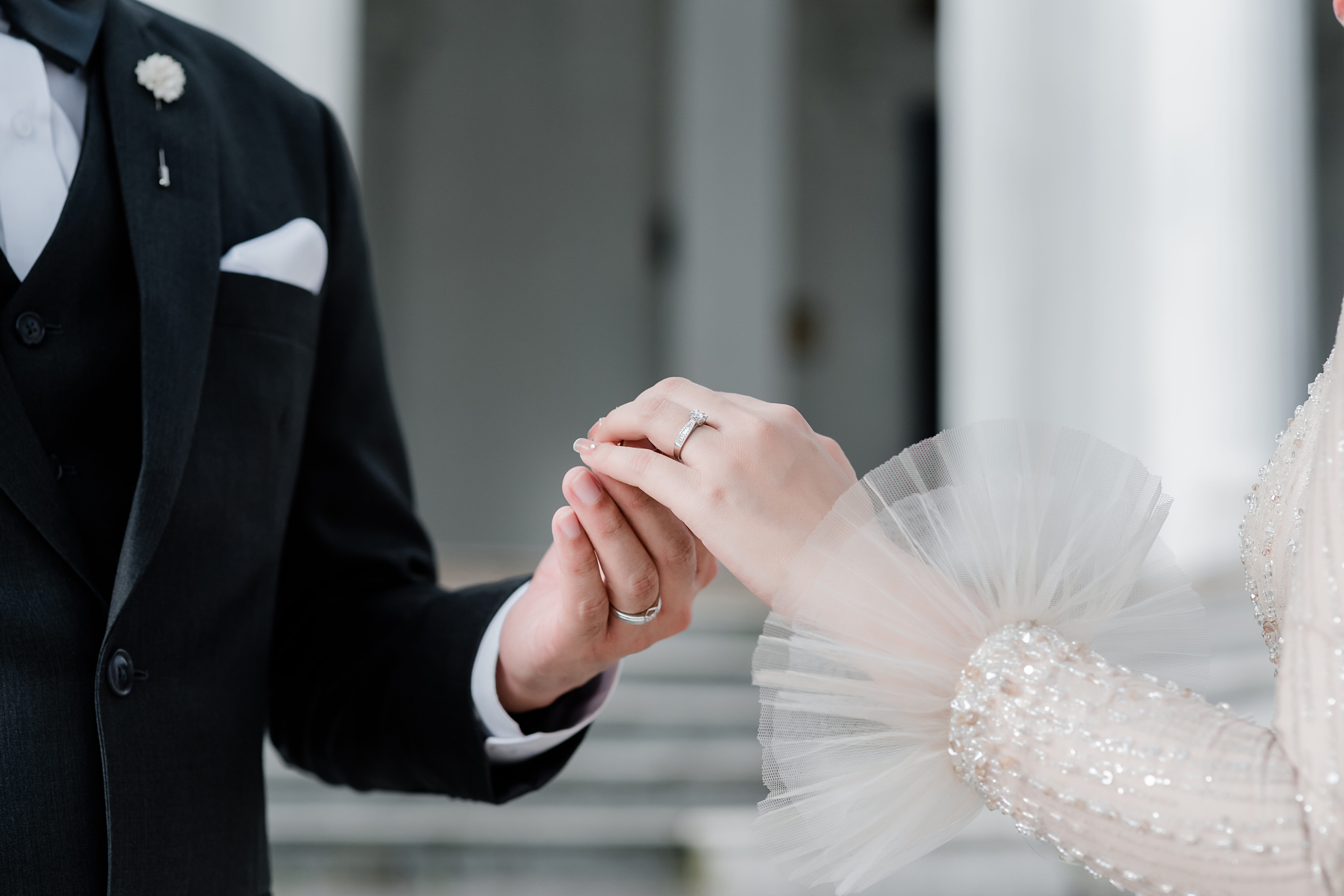 Muslim Couple Holding Hands Together With Wedding Rings, Muslim Wedding, Wedding Poster, Invitation Card, Copy Space .